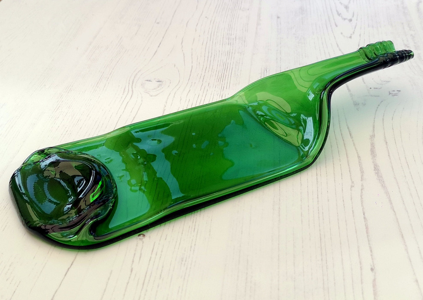 Handmade fused glass Recycled Wine Bottle Plate or Spatula With Raised Neck Handle. Squashed, slumped bottle serving dish. Eco gift, zero waste, reclaimed, upcycled glass platter.