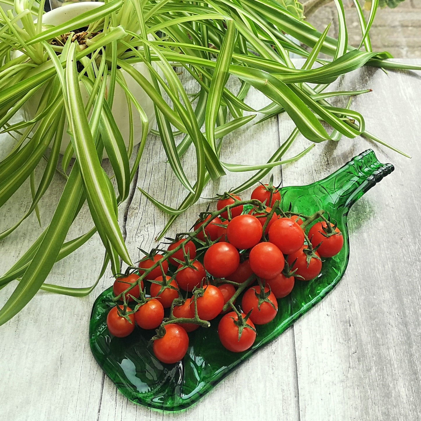 Handmade fused glass Recycled Wine Bottle Plate or Spatula Shape With Raised Neck Handle & Spiral Pattern. Squashed, slumped bottle serving dish. Eco gift, zero waste, reclaimed, upcycled glass platter.