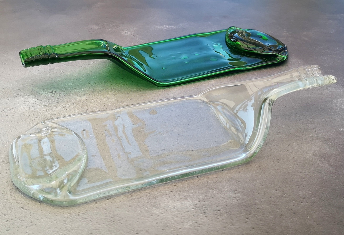 Handmade fused glass Recycled Wine Bottle Plate or Spatula With Raised Neck Handle. Squashed, slumped bottle serving dish. Eco gift, zero waste, reclaimed, upcycled glass platter.