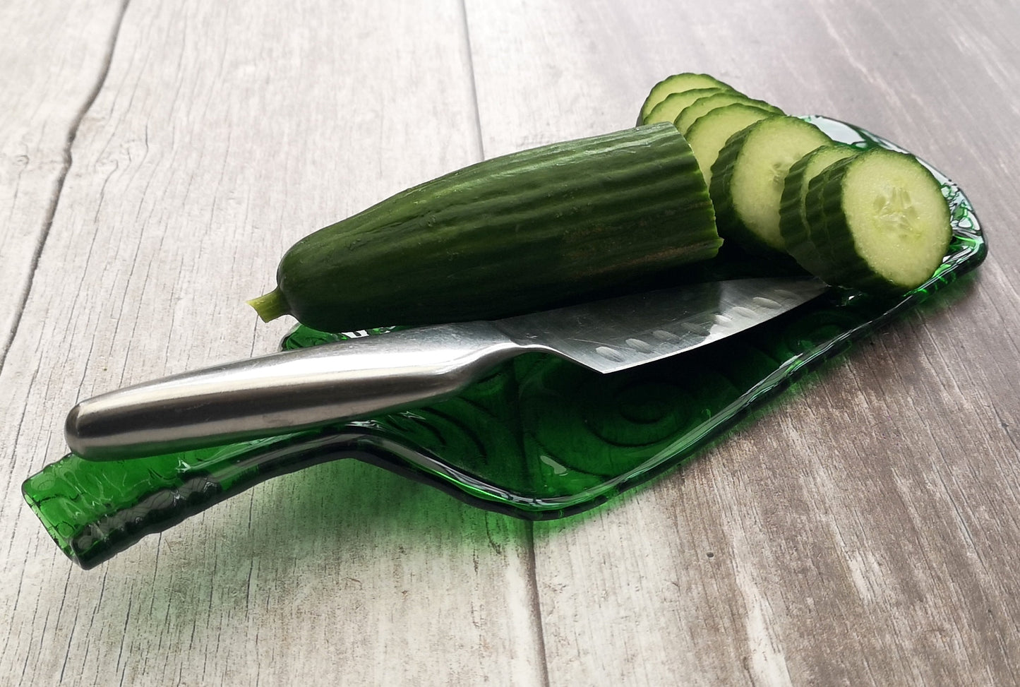 Handmade fused glass Recycled Wine Bottle Plate or Spatula Shape With Raised Neck Handle & Spiral Pattern. Squashed, slumped bottle serving dish. Eco gift, zero waste, reclaimed, upcycled glass platter.