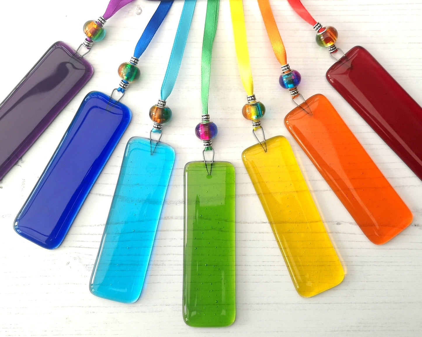Handmade fused glass Rainbow Drops. Hanging Christmas tree decoration. Glass suncatcher bauble ornament, holiday decor gift, festive present.
