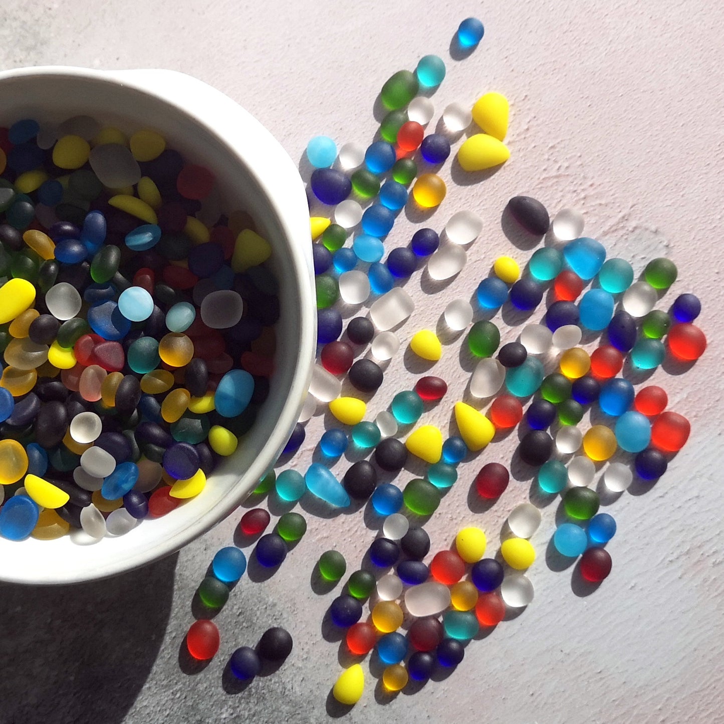 Crafting inspiration with tiny tumbled glass in multiple hues