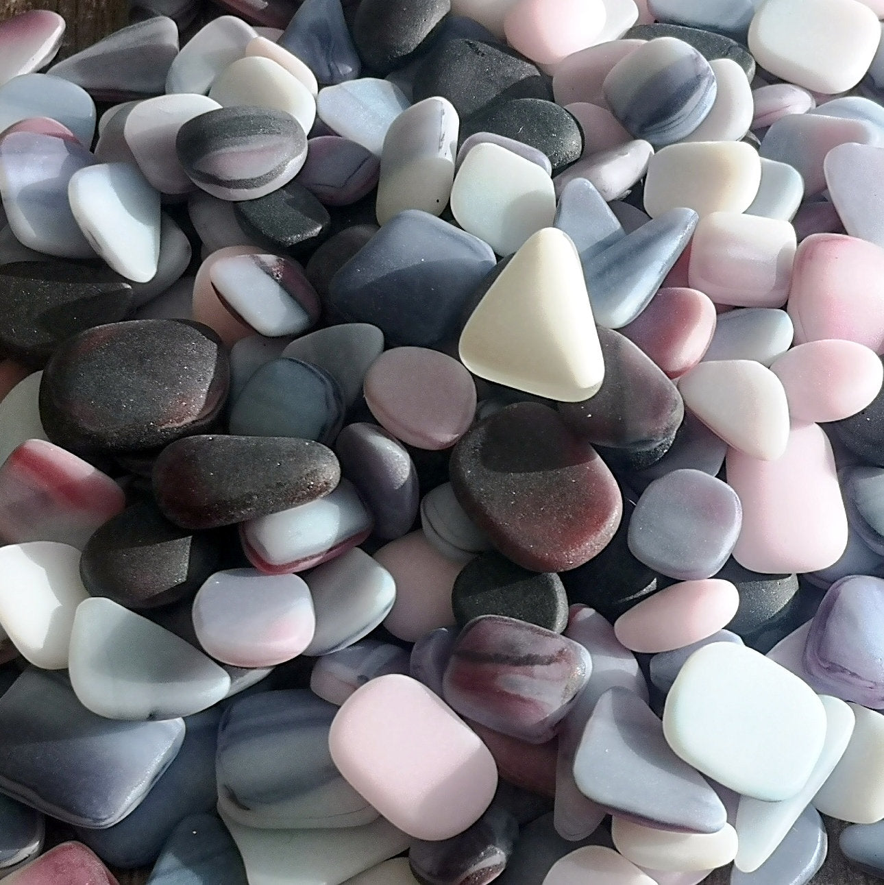 Vibrant and Smooth Tumbled Glass Assortment in Pink, Purple, and White, Ready for Seaside Projects