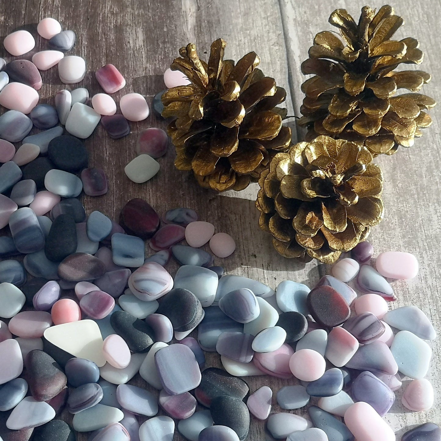 A Soothing Pastel, Bright and Dark Coloured Mix of Tumbled Glass in Pink, Purple, and White, Ideal for Crafting and Home Décor