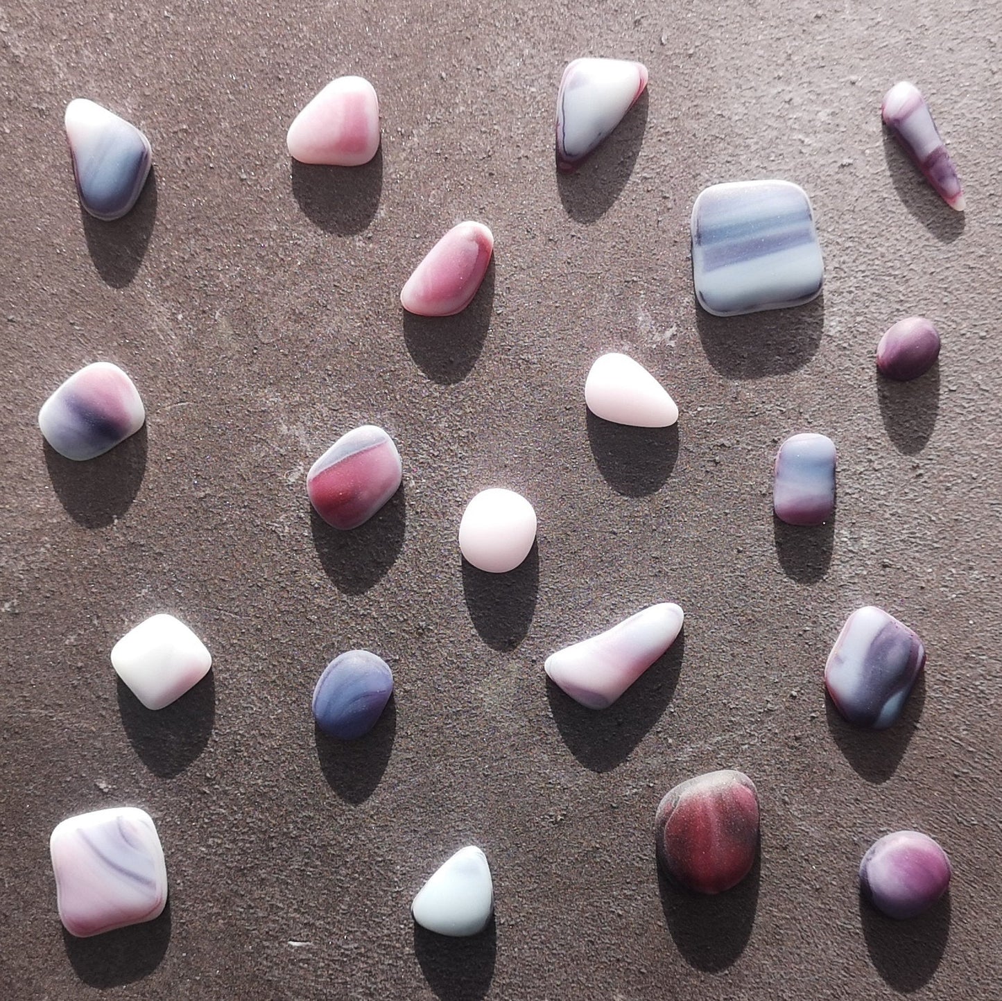 Close-Up of Pink, Purple, and White Seaglass. Tumbled Pieces for Mosaic and Picture Decoration.