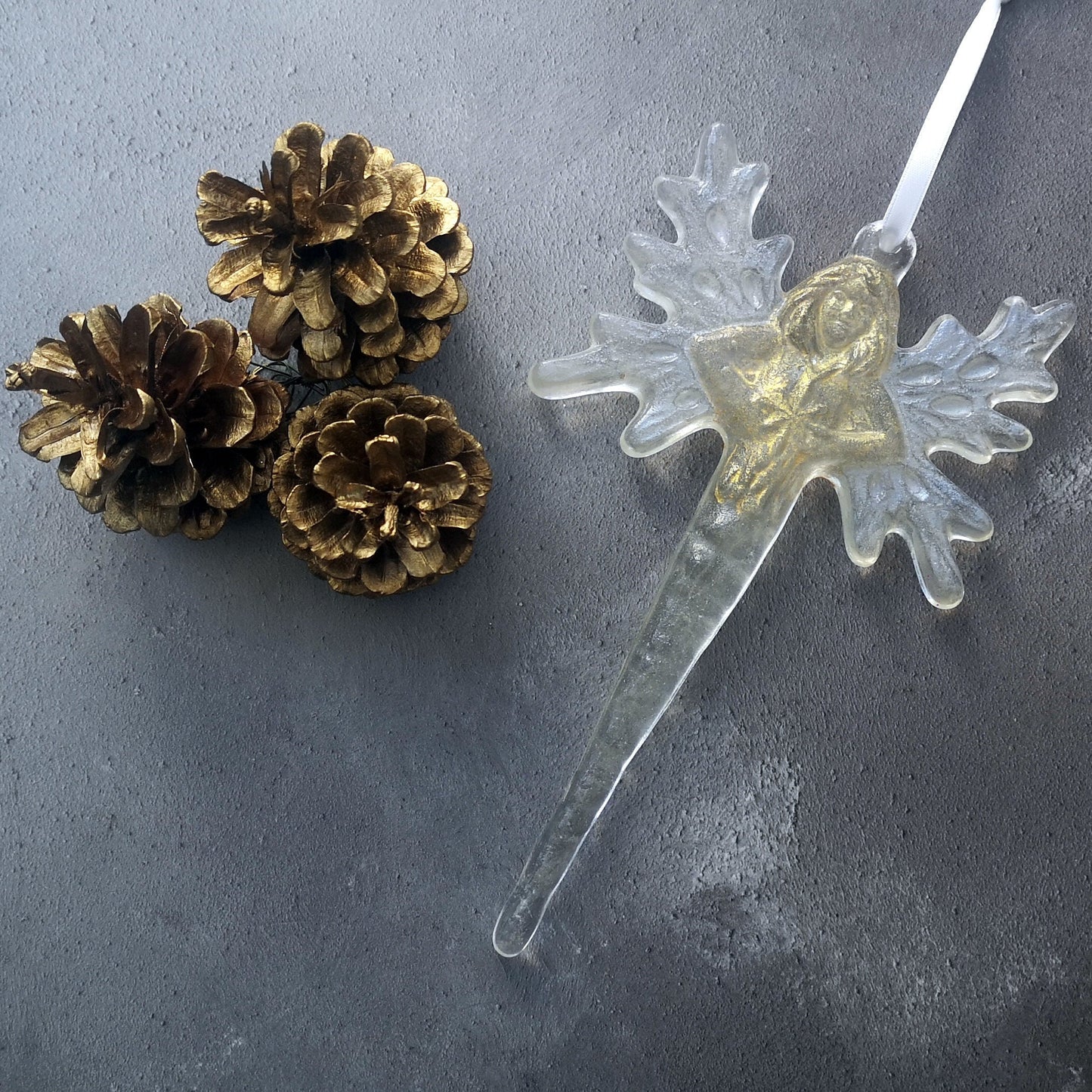View of the angel / fairy icicle suncatcher, capturing the light, perfect for window decoration