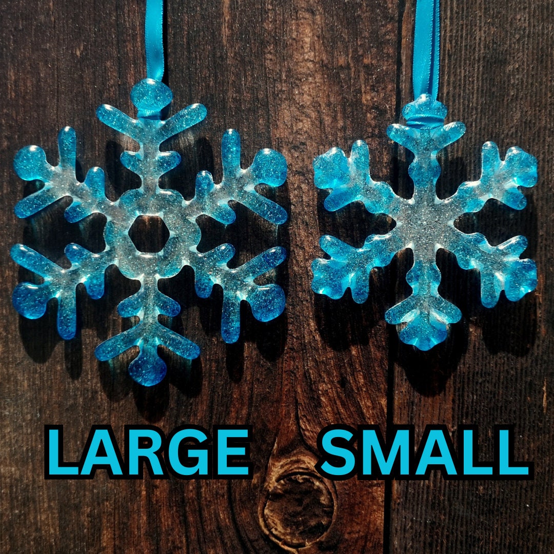 Unique Wintry Decor: Fused Glass Snowflakes with Turquoise Blue Tips, showing the difference between the two sizes. Perfect for festive holiday ambiance