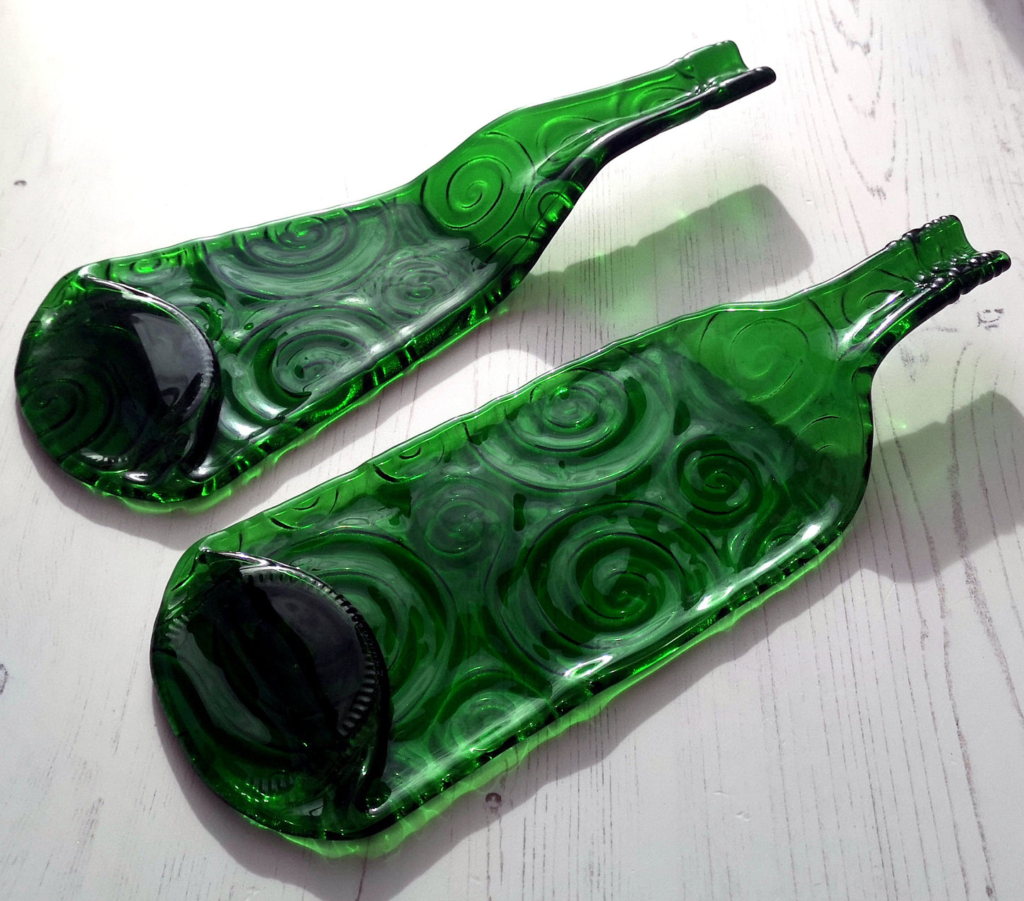 Handmade fused glass Recycled Wine Bottle Plate or Spatula Shape With Raised Neck Handle & Spiral Pattern. Squashed, slumped bottle serving dish. Eco gift, zero waste, reclaimed, upcycled glass platter.