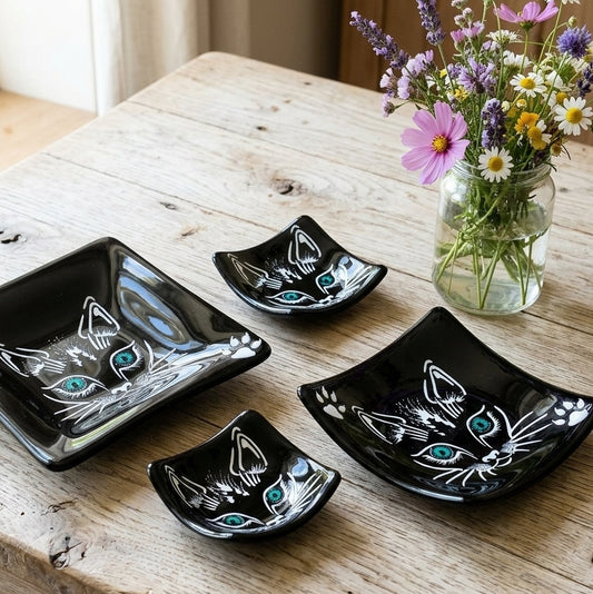 Handmade fused glass cat face bowls, with reflective dichroic glass eyes. Hand painted dish. Four different size serving plates.  Cat lover Gift. Lucky black cat.