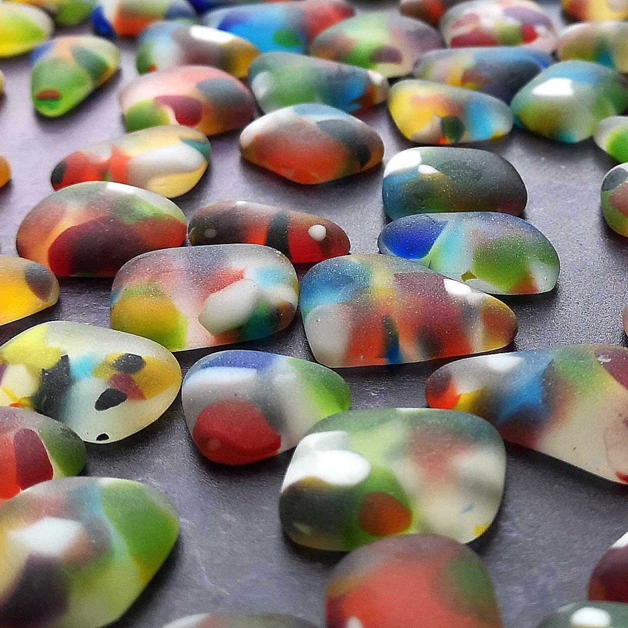 Close up view of colourful tumbled sea glass ready for your creations